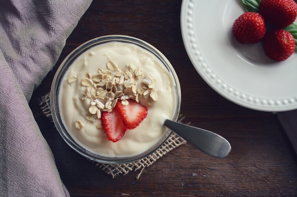 Mindful breakfast yogurt granola and strawberries